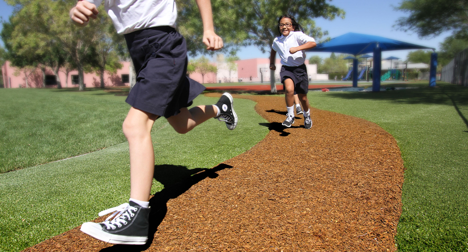 Duraflex bonded rubber mulch running path on kids playground